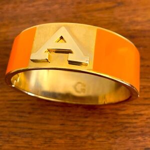 Vintage C. Wonder Gold Tone and Orange Enamel Hinged Cuff Bracelet